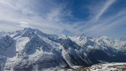 Naklejka na ściany i meble Caucasus spring snow mountain