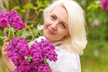 Fototapeta premium Portrait of a blonde in a lilac
