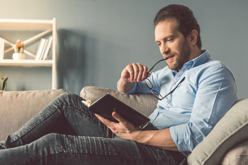 Handsome businessman at home