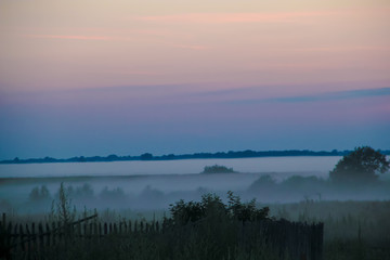 Fototapeta na wymiar Fog at sunset