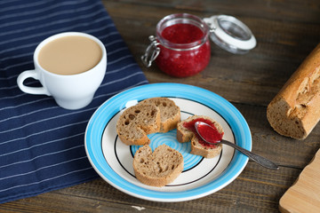 coffee slices of baguette with jam