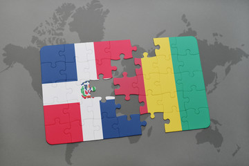 puzzle with the national flag of dominican republic and guinea on a world map