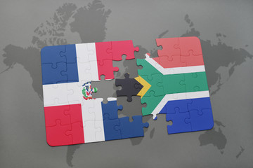 puzzle with the national flag of dominican republic and south africa on a world map