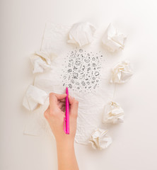 Obraz na płótnie Canvas Writing hand in crumpled paper