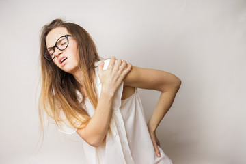 Fototapeta premium Body hurt,problems with back,young woman