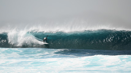 Surfer on a Barrel