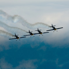 Fototapeta na wymiar 4 planes together. Airshow. Teamwork
