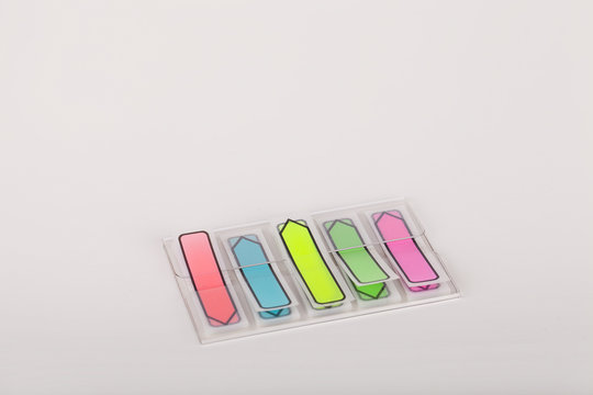 Colorful sticky tabs isolated on a white background.