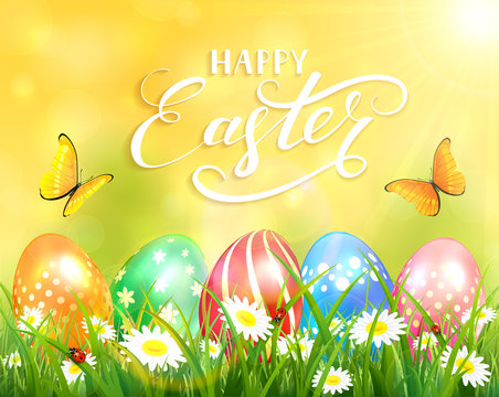 Happy Easter on yellow background and eggs on grass