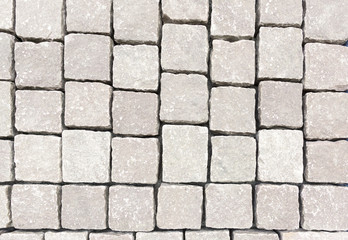 Granite cobblestoned pavement background