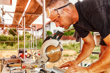 Carpenter at the Miter Saw