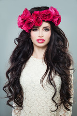 Nice Brunette Woman with Long Permed Hair, Beautiful Makeup and Flowers Wreath