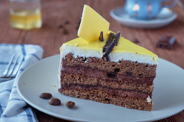 Delicious dessert cake with chocolate cream 