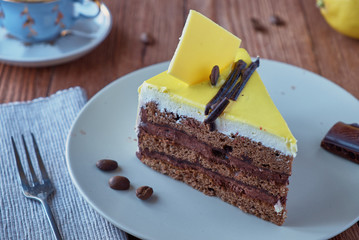 Delicious dessert cake with chocolate cream and coffee