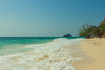 Poda island (Koh Poda) beach and waves, Krabi province, Thailand