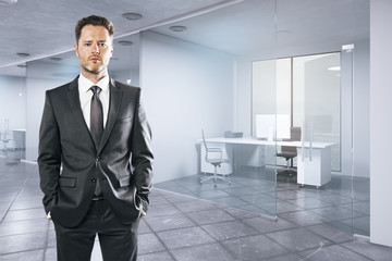 White businessman in office