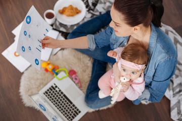 Inspiring modern mother managing many tasks at the same time