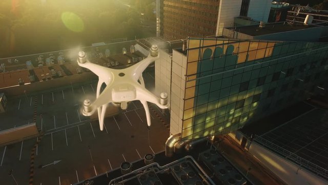 Aerial Shot of a Drone Flying Over Modern City. Shot on 4K (UHD) Camera.