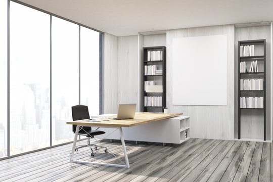 Corner of a CEO office with gray walls