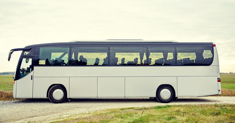 tour bus driving outdoors © Syda Productions