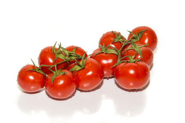 Herd of tomatoes, isolated on white background