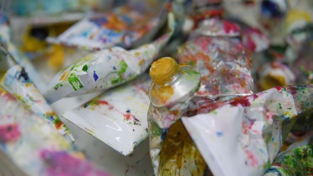 Used tubes from a paint close-up in an art workshop