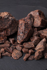 Dragon's blood is a red resin obtained from different species of plant : Croton, Dracaena, Calamus rotang. It has been in continuous use since ancient times as varnish, medicine, incense, and dye.