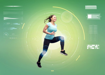 happy smiling sporty young woman jumping in air