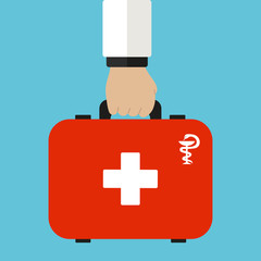 Hand with a medical suitcase