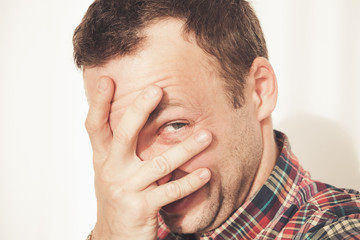 Fototapeta premium Laughing young adult Caucasian man