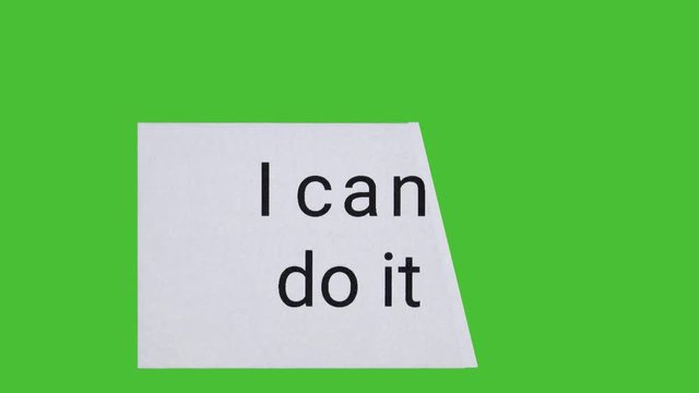 Card on green screen with piece blowing away to change text from "I can't do it" to "I can do it"