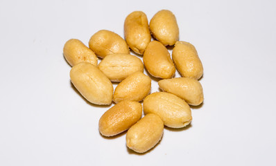 Plenty of peanuts on a white background