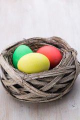 Easter eggs in the nest. Spring discount card.