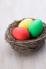 Easter eggs in the nest. Spring discount card.