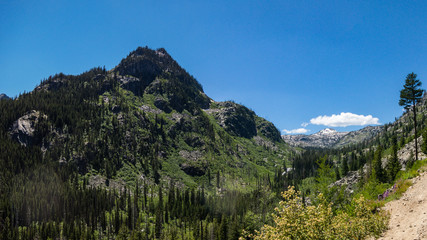 Mountain summit and glacial valley in early spring colors