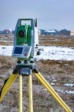 Measurement of land for construction. A theodolite.Total station