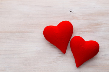Fototapeta na wymiar Red hearts the gray background. Valentine Day background.
