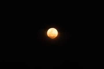 full moon on dark sky