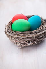 Easter eggs in the nest. Spring discount card.