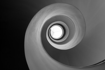 Spiral staircase view from below.