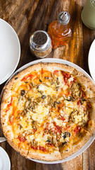 vegetarian pizza consist of different kinds of mushroom and rosemary