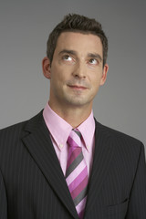 Businessman looking up