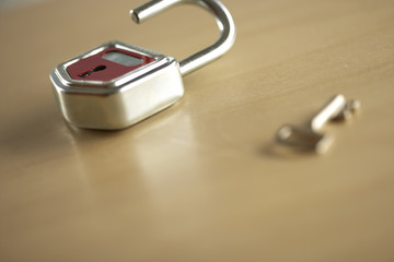 An unclosed lock and a key