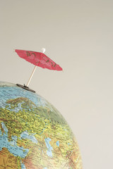 A drinks umbrella at a globe