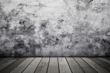 Grunge interior with bare concrete wall..