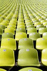 Numbered seats in an empty stadium