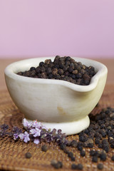 Peppercorns in a mortar