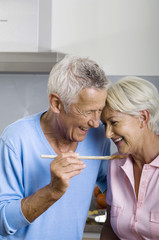 Senior couple cooking together