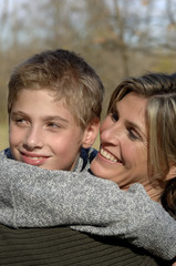 Fototapeta premium Boy embracing Woman
