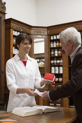 Fototapeta na wymiar Customer paying drugs in a pharmacy
